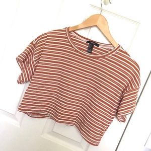 brownish orange and white striped shirt
